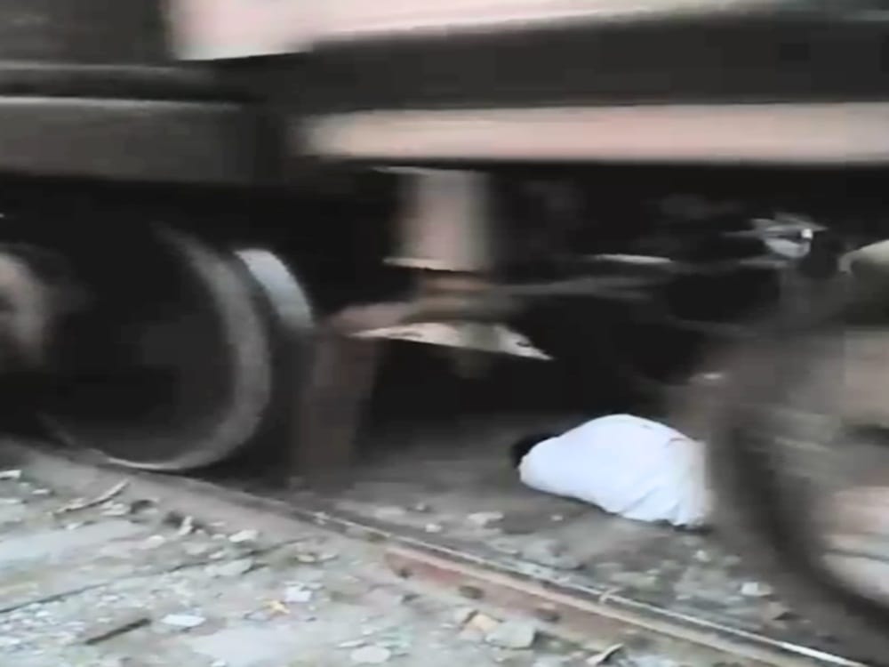 miracle saved Man life who fall under the running  train video viral