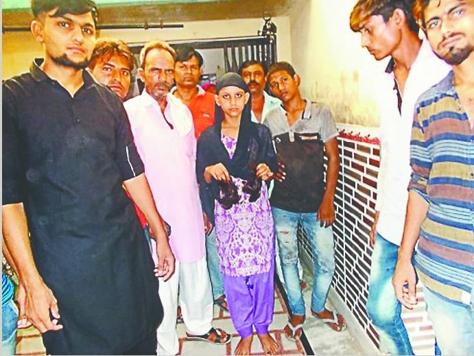 Girl in Baroda and baby hair cut in baghpat