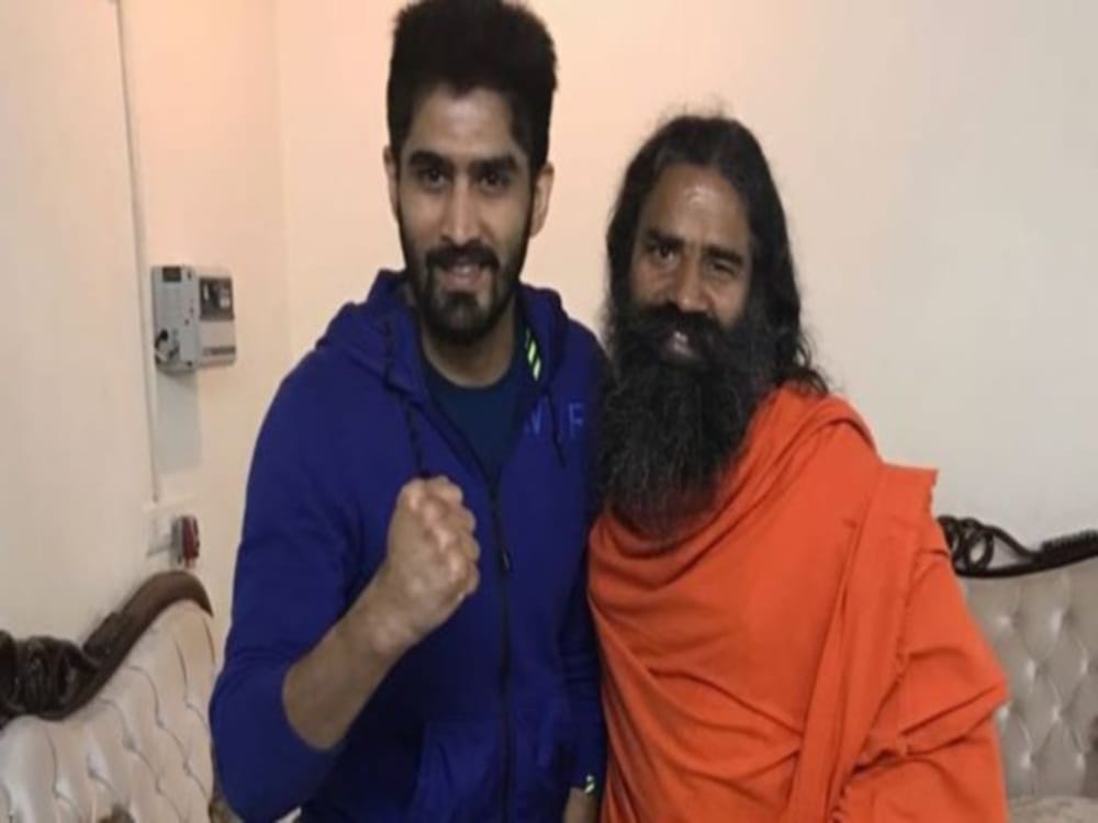 baba ramdev statement on twitter for doklam during Boxer vijendra victory 