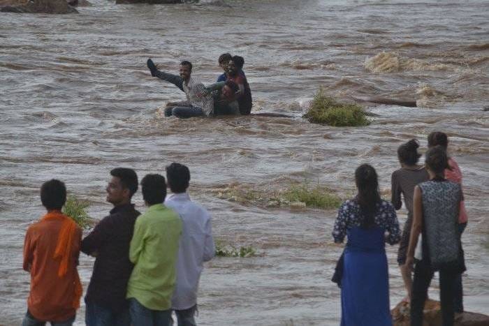 in pictures- see how people risks their life for enjoyment 