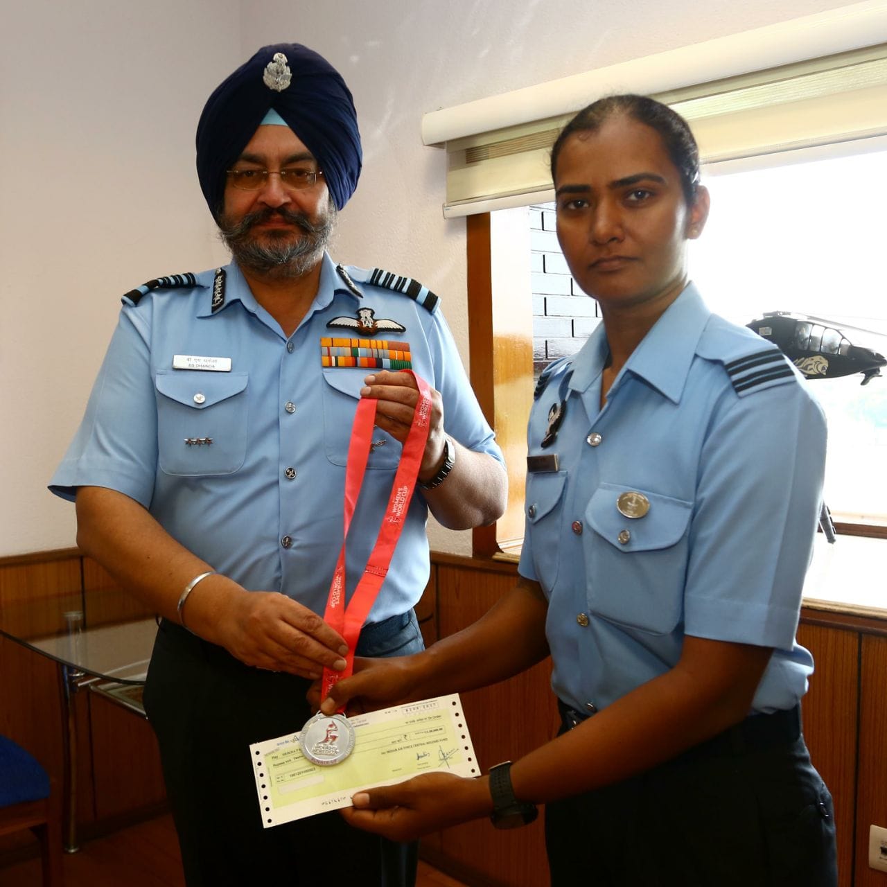 flight lieutenant shikha pandey becomes first Indian cricketer, IAF chief felicitates 