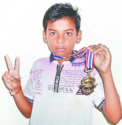 tweleve year old aryan won gold medal in Taekwondo international championship