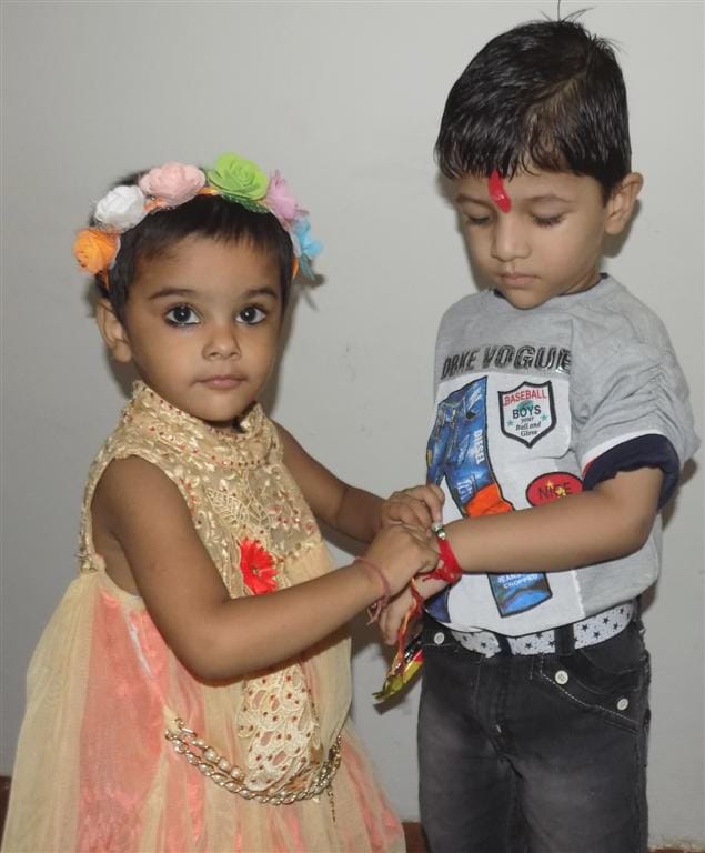 Rakshabandhan: sisters shed love on brother's wrist