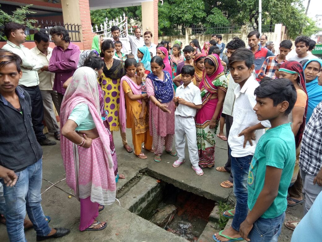 Child drowns in an open manhole
