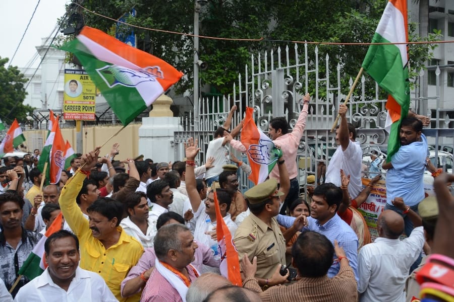 Congress activists demonstrate and protest against BJP in Lucknow.
