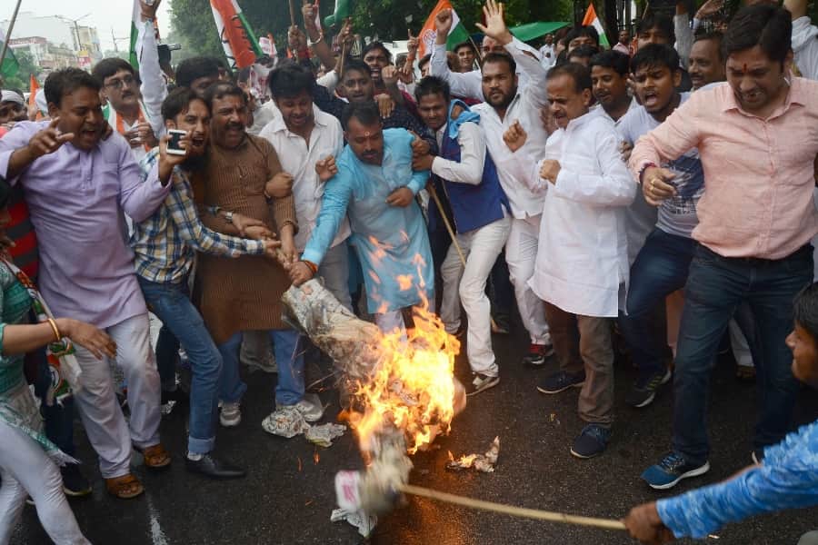 Congress activists demonstrate and protest against BJP in Lucknow.