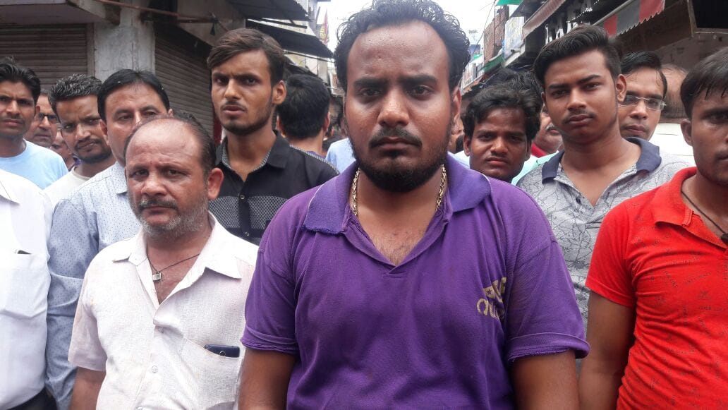 businessman in agra protest against police