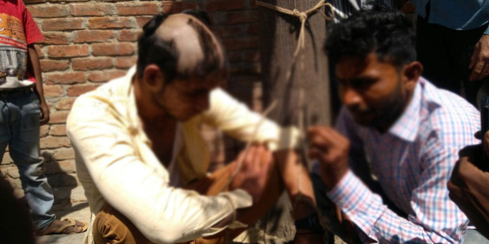 public punishes a man accused of teasing a woman in bihar