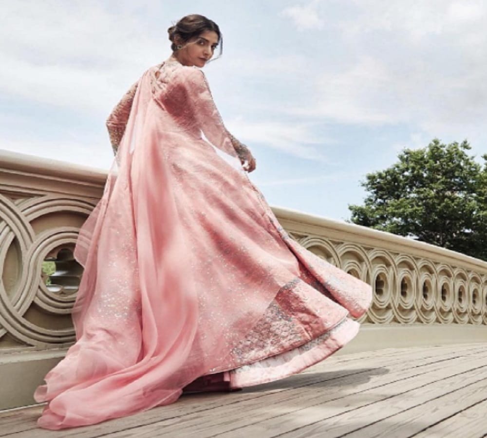 Bollywood actress Sonam Kapoor photo shoot for bazaar bride magazine cover page 