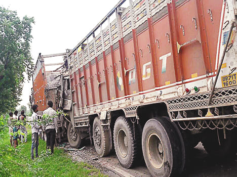 Second truck rammed into truck standing, driver dies