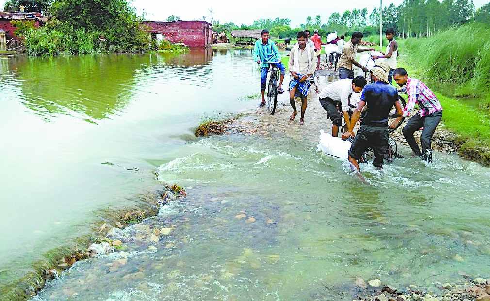 The waves of the ghagra rocked the devastation, the youth dipped
