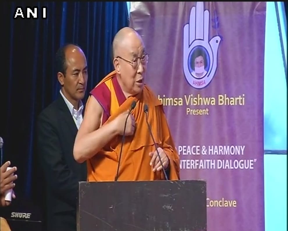 Dalai Lama and Baba Ramdev share a light moment at World Peace & Harmony Conclave in Mumbai