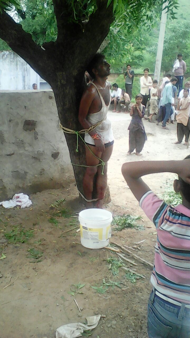 youth badly beaten up by villagers who is having a love affair with local woman in alwar