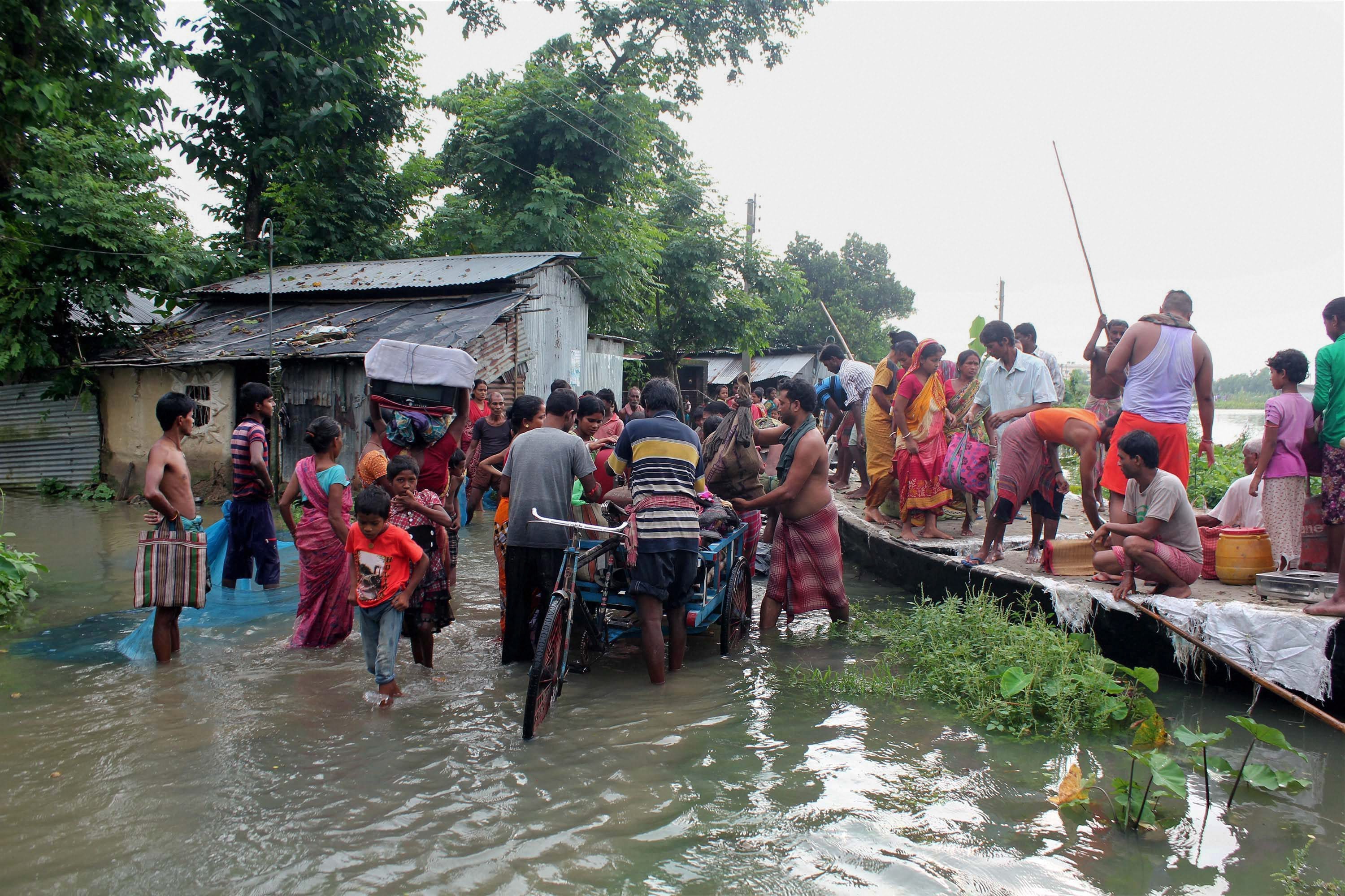 Photos that show the fatal nature Of the floods in assam bihar and up