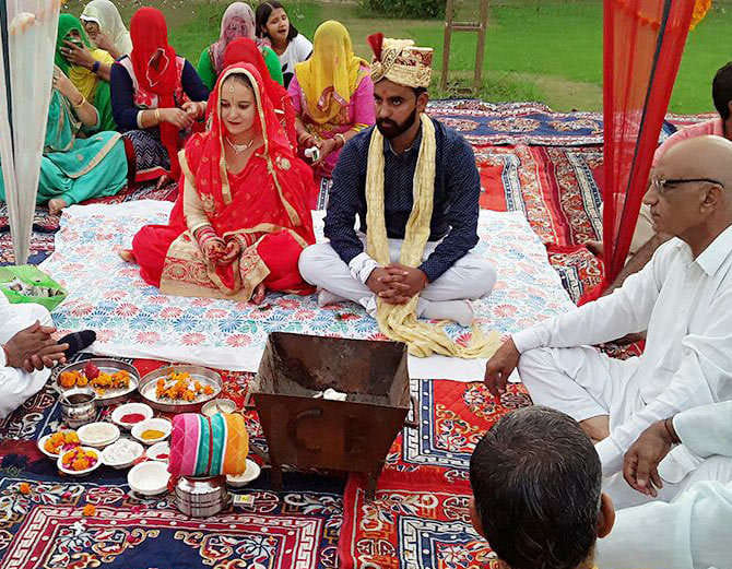 facebook love story, unique marriage, russian girl weds indian boy
