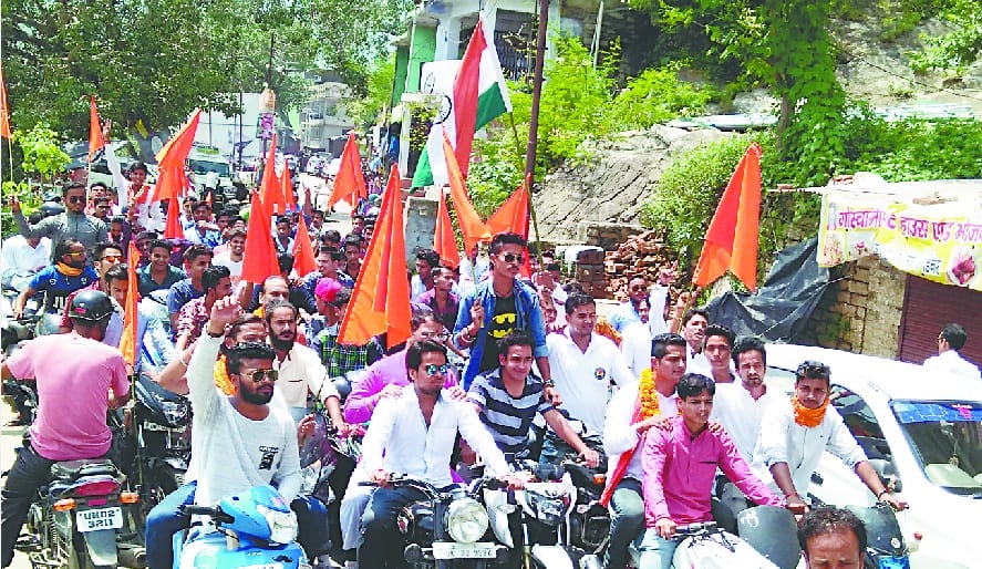 VHP workers lift bike rally