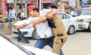 Car stops showing black flags to minister, 12 arrested