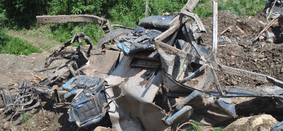 Driver dies in dump drop