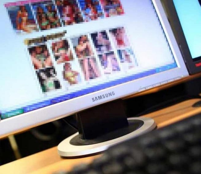 a man arrested for sharing lady constables mobile number on porn site