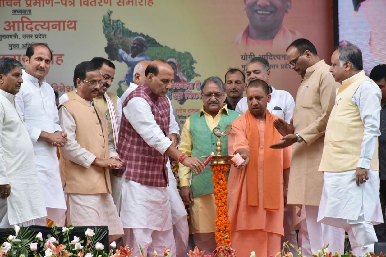 rajnath singh hands over debt relief certificates to farmer