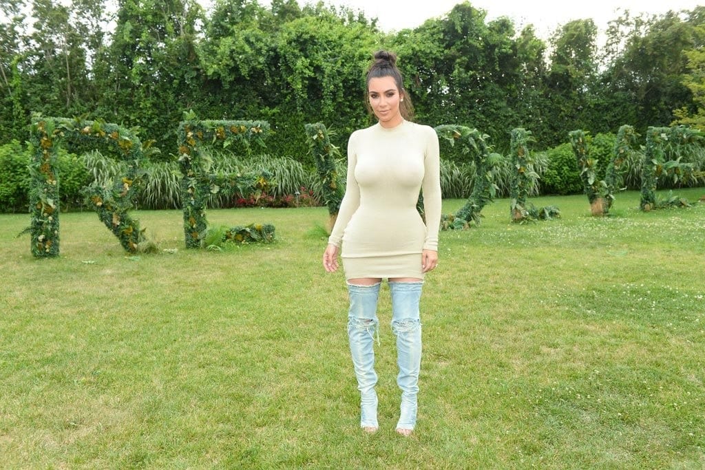 is sara ali khan setting denim  boots fashion trend like kim kardashian