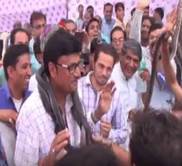 Snake trapped in minister's neck