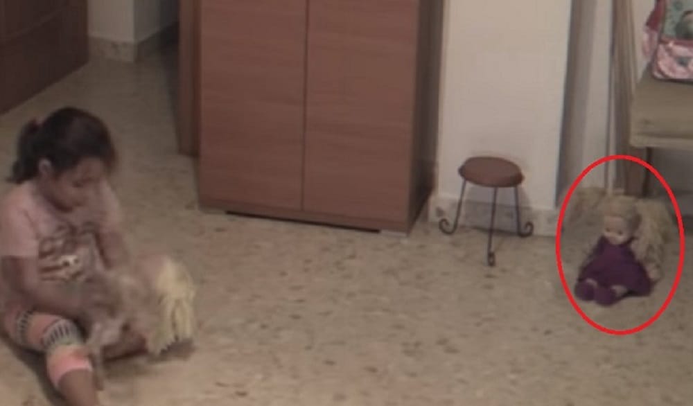 watch creepy doll moving its head on its own in this horror video