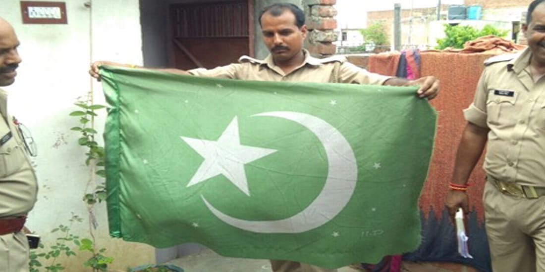 Pakistan flag fly on Kanpur womans terrace