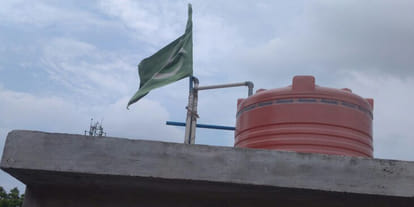 Pakistan flag fly on Kanpur womans terrace