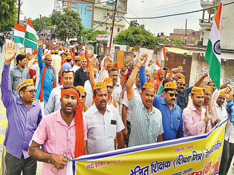 Education festivities take tri-color journey
