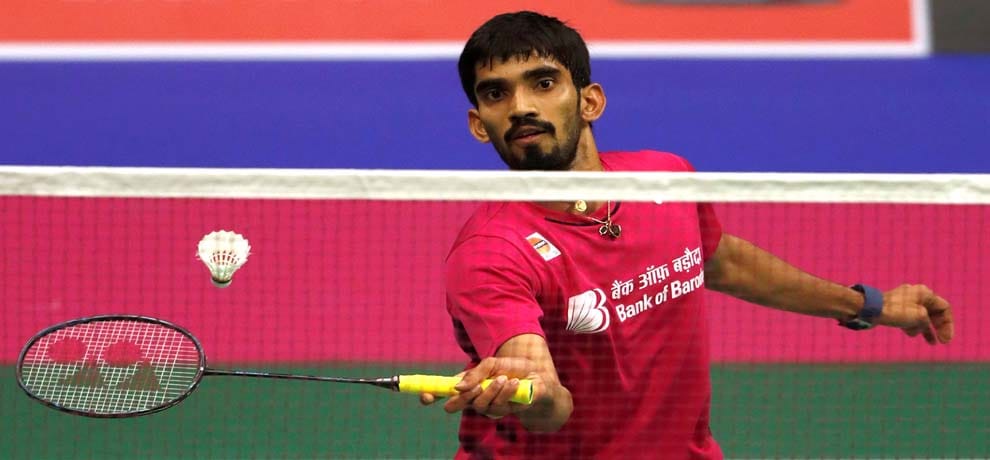 kidambi srikanth receives a bat from ms dhoni
