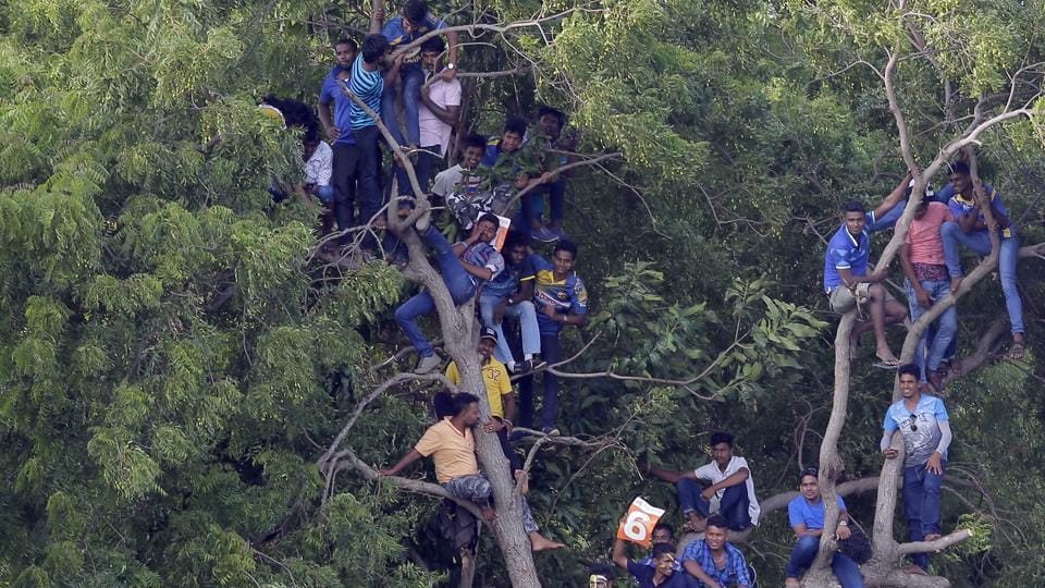 odi defeat: dejected sri lankan fans circled team bus at dambulla