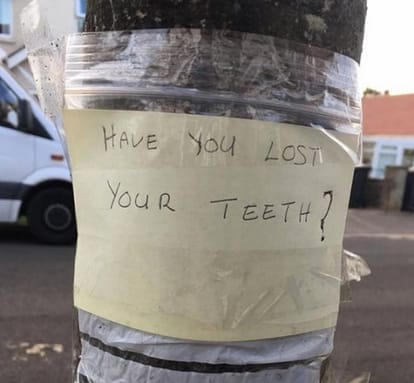 Woman found mysterious packet of teeth hanging in plastic from tree in England