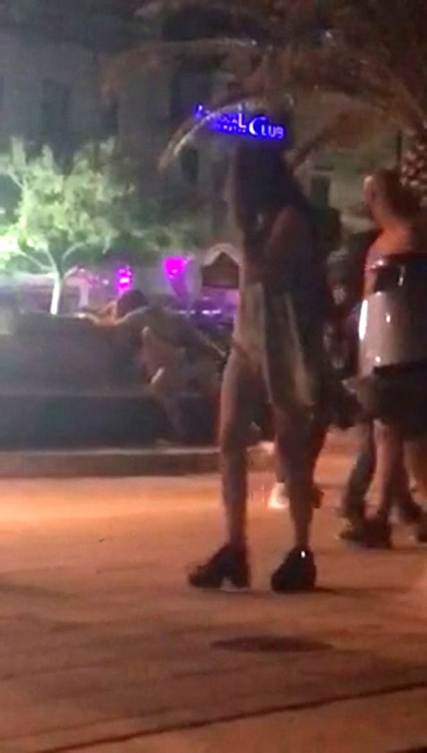 a shameless couple catched having Intimate in public place