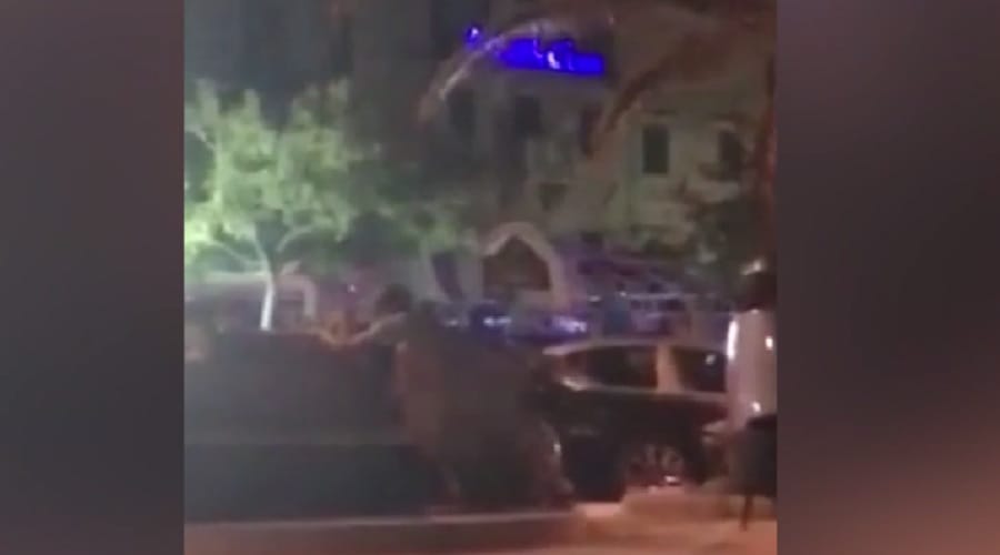 a shameless couple catched having Intimate in public place