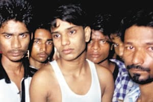 Two youths immersed in the Ganges on Begum Sarai Ghat