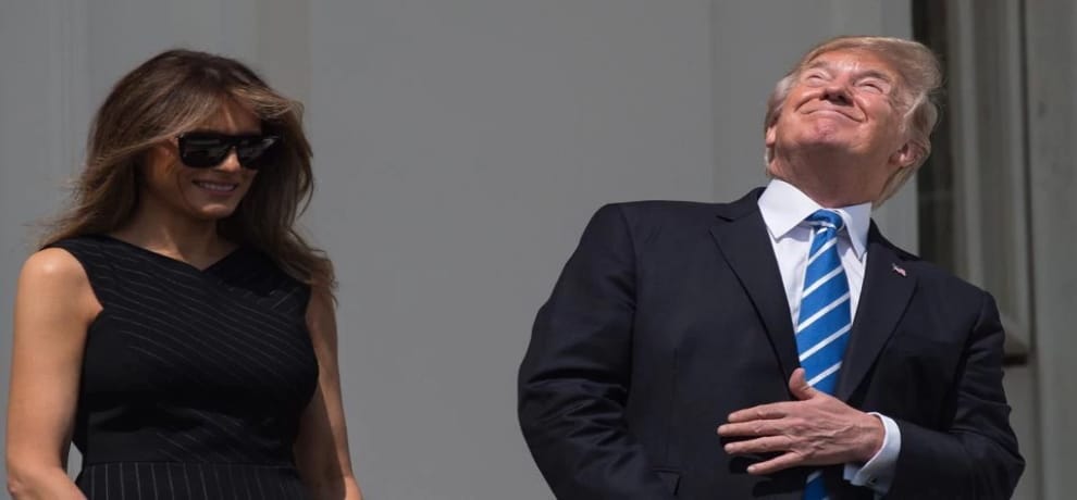 president trump looking at solar eclipse without sunglasses