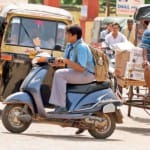 student driving without helmet