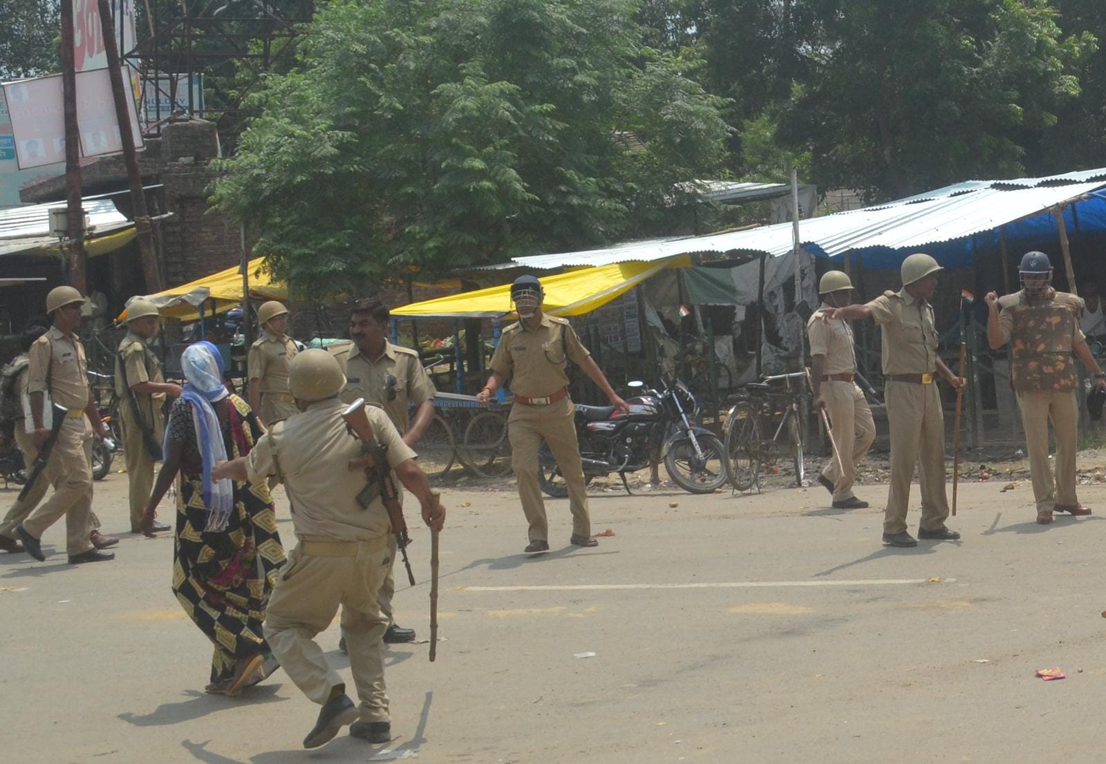 See photos: Police lathicharge on villagers  in Azamgarh, beating women with vandalism