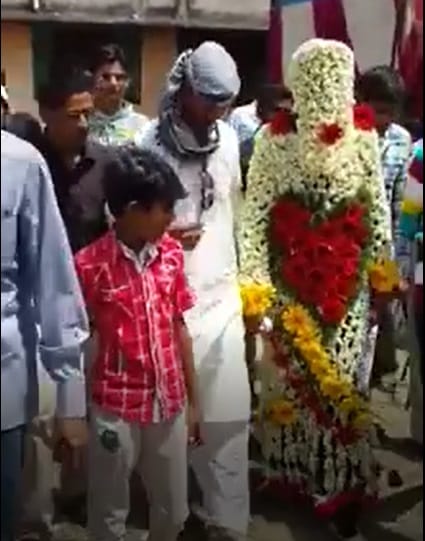 groom with full flower dress  you can not stop laughing