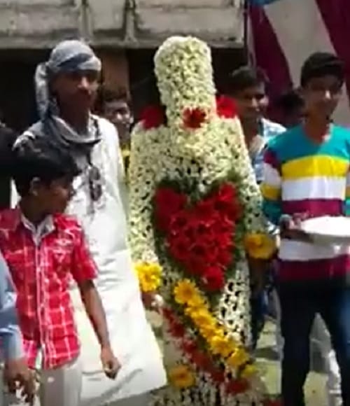 groom with full flower dress  you can not stop laughing