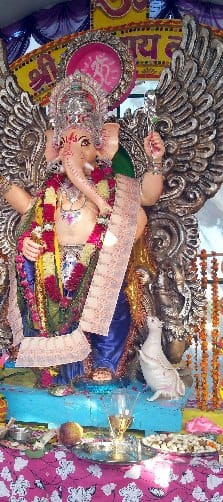 Ganpati Bappa Morya's cheerful pooja pandal