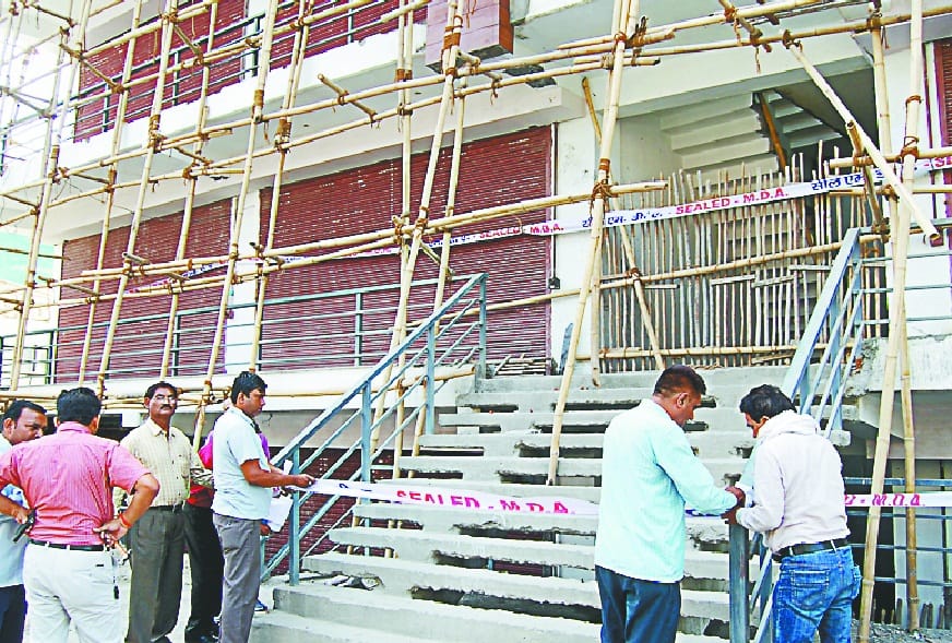 behind curtain illegal complex will be closed