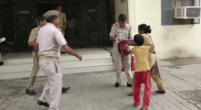 woman in agra tried to fire herself in collectrate 