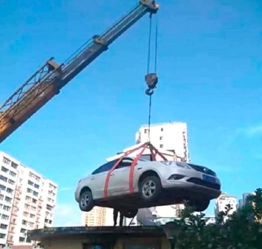 Woman Leaves Car Blocking Parking Entrance later it was Found On A Roof