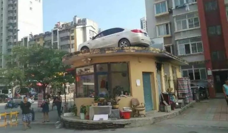 Woman Leaves Car Blocking Parking Entrance later it was Found On A Roof