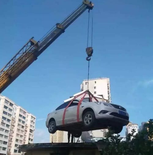 Woman Leaves Car Blocking Parking Entrance later it was Found On A Roof
