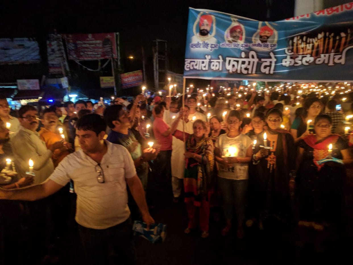 Candle march of sindhi community in Lucknow for action against murderer of businessman.