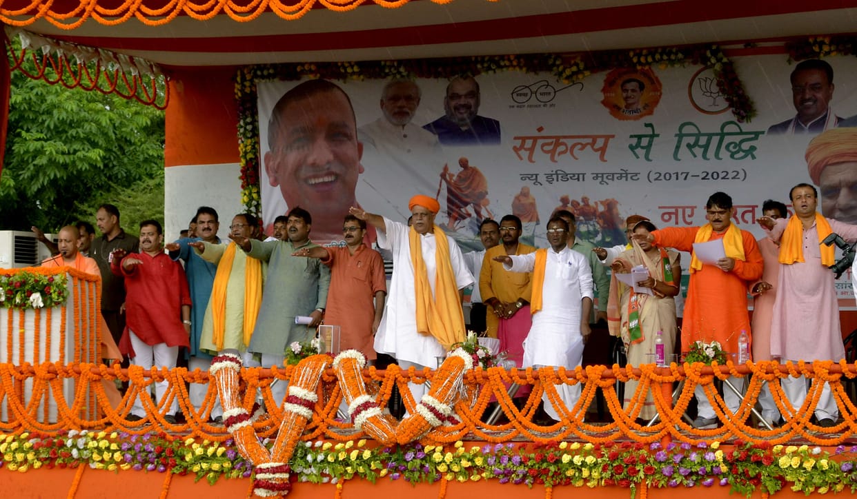 yogi adityanath give and take oath of new india in rain at varanasi