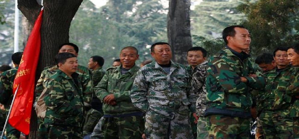 Chinese army pulls up their tents go back with bulldozer